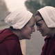Image of Elisabeth Moss and Madeleine Brewer in Hulu's The Handmaid's Tale